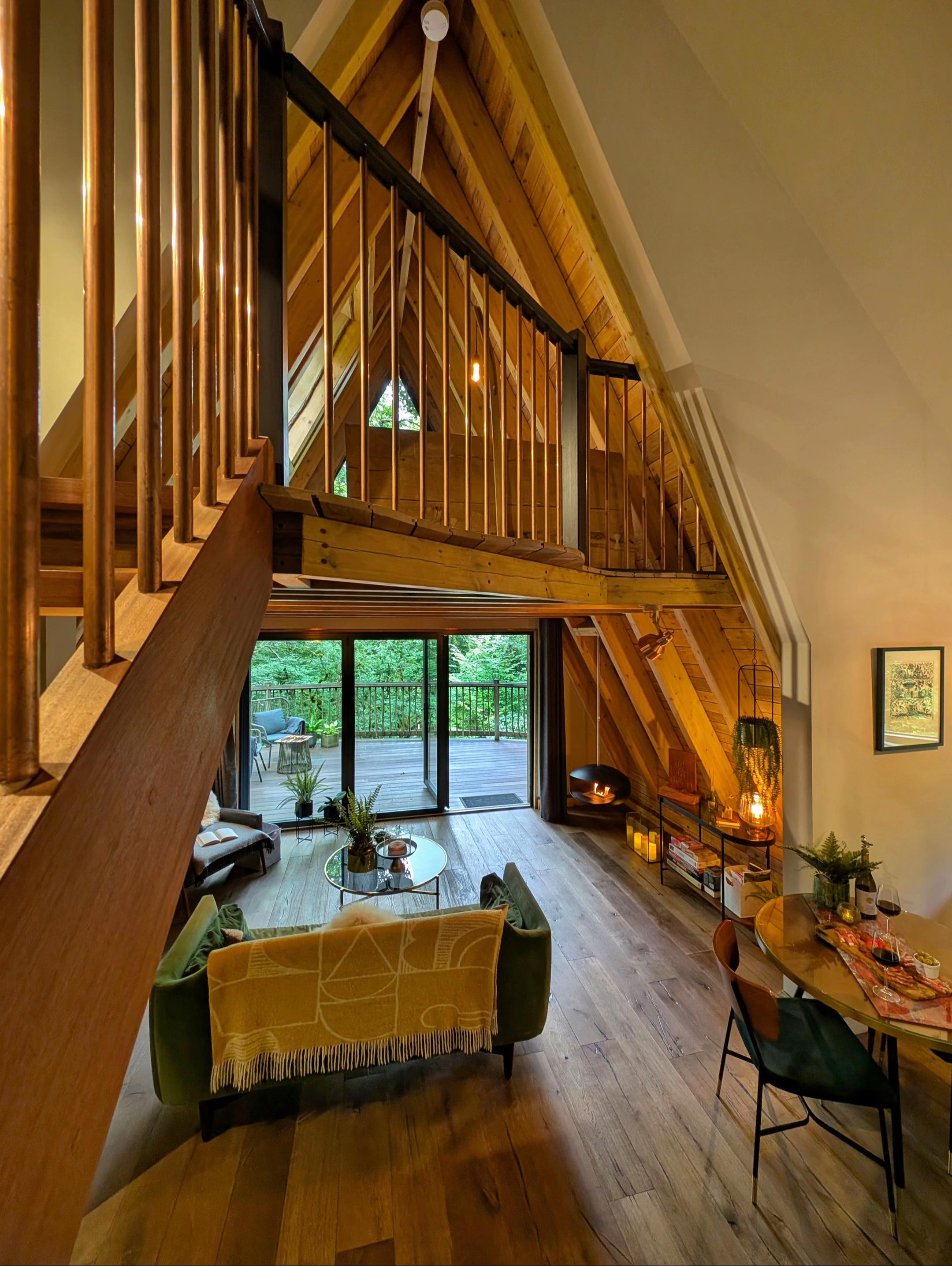 Open-plan A-frame cabin interior